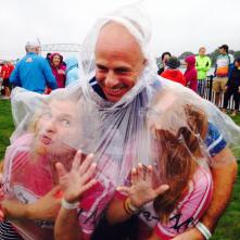 Judy, Pete and Gi try to avoid the rain. Next year, more ponchos.